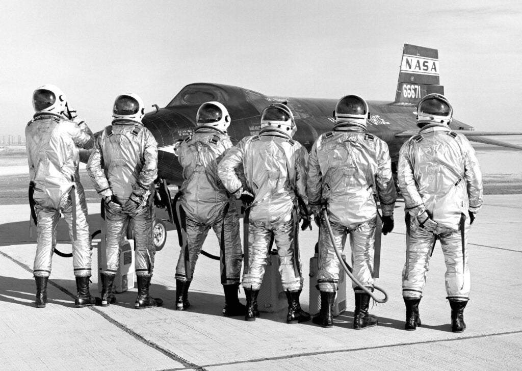 X-15 pilots in a playful mood in 1966. I guess when you're flying to the edge of space in a missile with a cockpit you gotta let off steam.