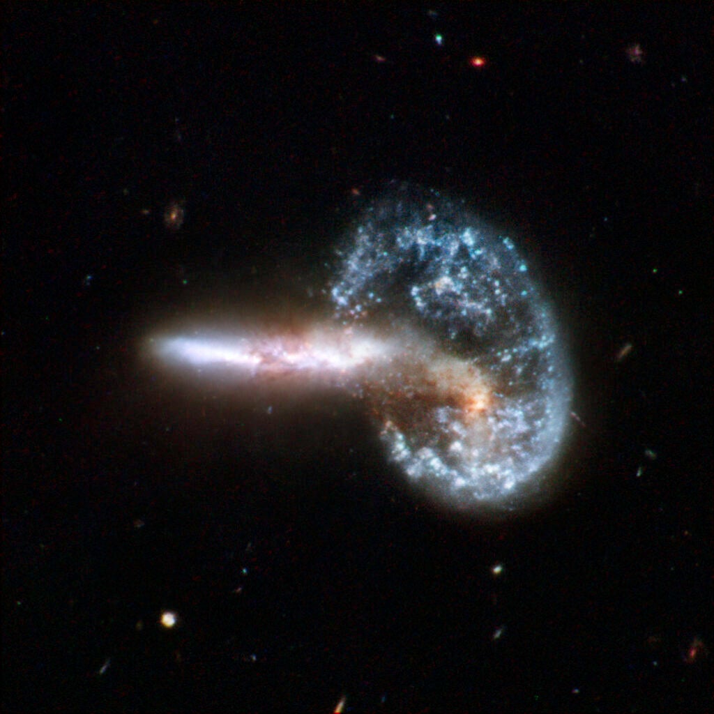 two galaxies mid collision