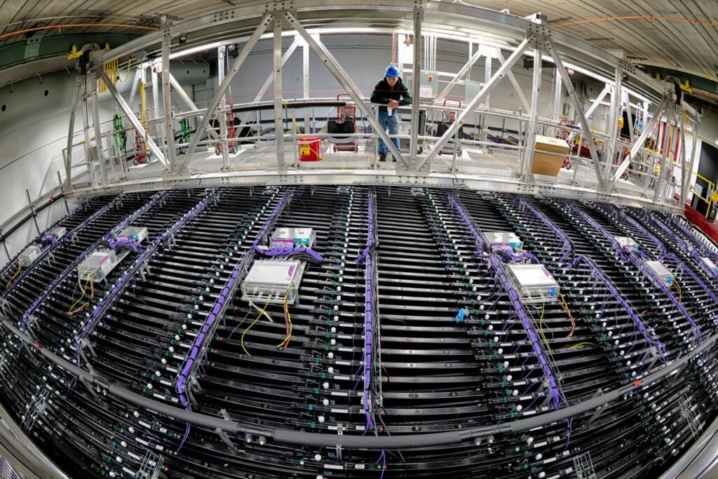 Electronics get installed onto a Fermilab's neutrino detector.