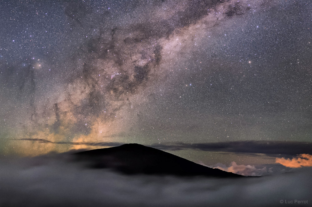 What is this magical place? It's the top of Piton de la Fournaise volcano on Réunion Island, in the Indian Ocean. That's the Milky Way, of course, above the volcano.