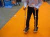 Strap on a pair of robot skates that can automatically move forward when they sense a user leaning forward. Dr. Toshinobu Takei of Japan's National Institute of Advanced Industrial Science and Technology (AIST)demonstrated at IREX.