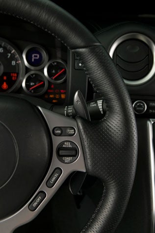 Using the Vehicle Dynamic Control, you can choose three settings—normal, comfort, and "R," which we assume stands for "racing."