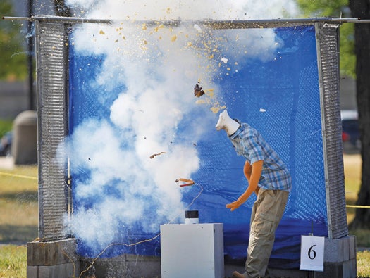 A mannequin's head is blown up as an "aerial display" fireworks explodes during the Consumer Product Safety Commission demonstration on the Capitol grounds in Washington, Tuesday, June 29, 2010, to highlight consumers putting safety in play if fireworks are part of their Fourth of July celebrations.