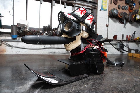 A rocket-powered belt sander with a skull on it.