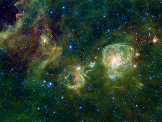WISE's four infrared instruments could see where other telescopes can't, like into this dark, obscured region of the constellation Vela, a region covered in dense clouds of dust and gas impenetrable in the visible spectrum. In this image, blue and cyan represent light at shorter wavelengths that is dominated by star light. Greens and reds show larger wavelength light emanating from gas and dust.