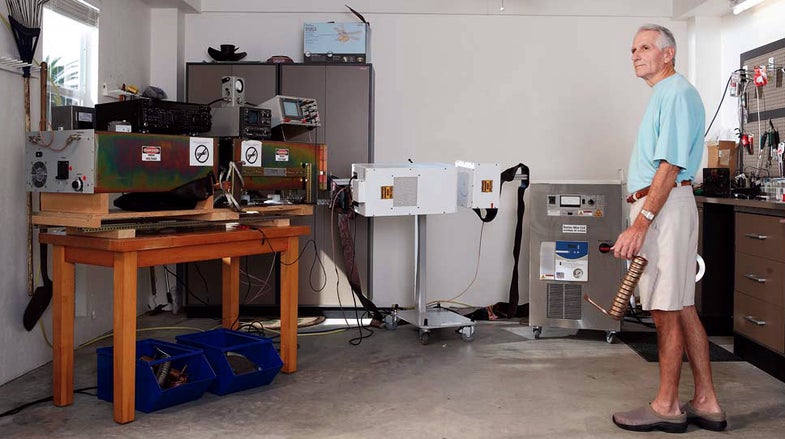 John Kanzius in his garage with different versions of his tumor-cooking RF-field generators
