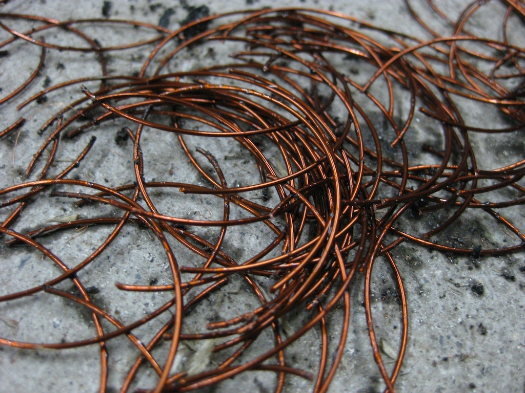 A closeup of the coils shows that the ignition coil contained a non-trivial amount of copper.