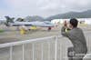 A visiting foreign pilot takes a picture of the Pterodactyl (Wing Loong in Mandarin Chinese) during the 2012 Zhuhai Air Show. China has already achieved some success for its UAV export ambitions by selling the Pterodactyl to Middle Eastern customers.