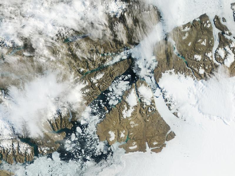 The Petermann Glacier, off the coast of Greenland, just lost another huge chunk, creating an iceberg. NASA captured the "calving" as it happened. Read more <a href="http://www.nasa.gov/multimedia/imagegallery/iotd.html">here</a>.