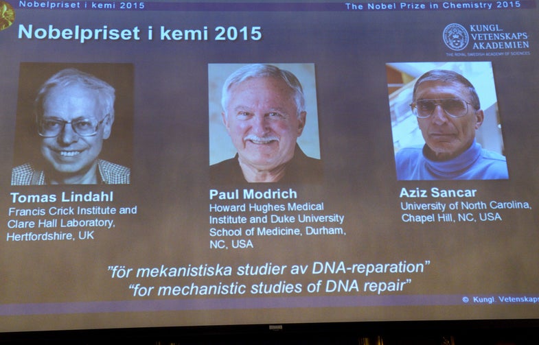 A view of the screen showing the winners of the 2015 Nobel Prize for Chemistry, during a press conference, in Stockholm, Wednesday, Oct. 7, 2015. Sweden's Tomas Lindahl, American Paul Modrich and U.S.-Turkish scientist Aziz Sancar won the Nobel Prize in chemistry on Wednesday for "mechanistic studies of DNA repair." (AP Photo)