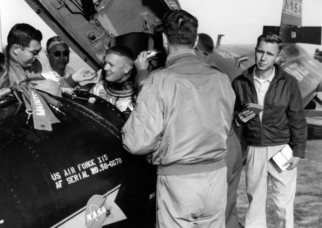 Ground crews greet Neil Armstrong after one of his first X-15 flights in 1960.