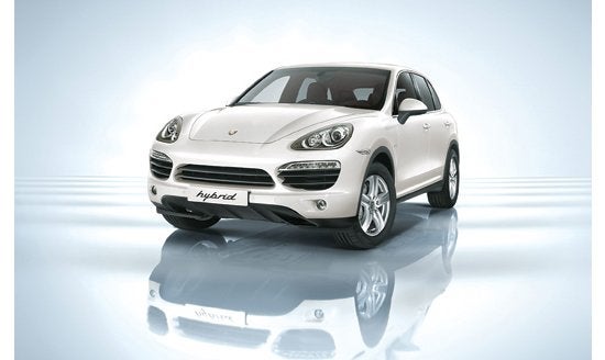 The hybrid version of Porsche's popular <a href="https://www.popsci.com/cars/article/2010-07/gentlemen-stop-your-engines/">Cayenne</a> SUV proves that performance and efficiency aren't mutually exclusive. Powered by a 333-horsepower supercharged V6 and a 47-horsepower electric motor mated to an eight-speed transmission, the Cayenne is as nearly as fast as the V8 version, yet it delivers 20 mpg in the city and 24 mpg on the highwaya€"up from 13 mpg city and 19 mpg highway. It also includes a smart feature that gasoline versions do not: On a downhill, the Cayenne shuts off the engine and decouples it from the transmission, so the car coasts fuel-free at highway speeds while recharging the battery. <strong>$69,000</strong> <em>Jump to the beginning of the <a href="https://www.popsci.com/?image=0">Auto Tech</a> section.</em> <strong>Jump to another Best of What's New category:</strong>