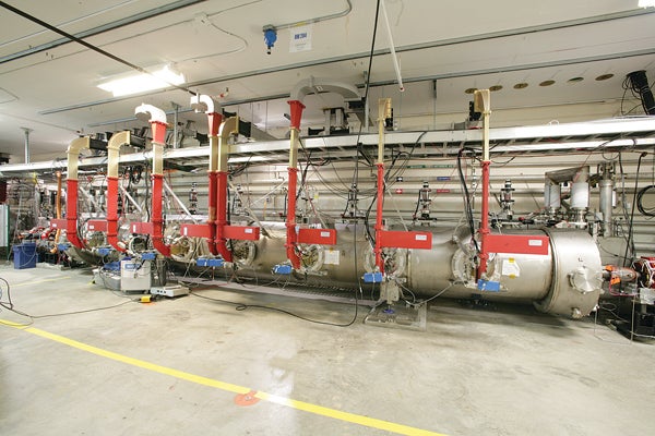 To generate a 10-kilowatt laser, an accelerator [shown here] adds 115 megavolts of microwave energy to an electron beam, boosting its speed and strength.
