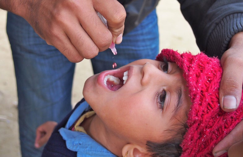 A child gets polio drops during a vaccination campaign in Nepal.