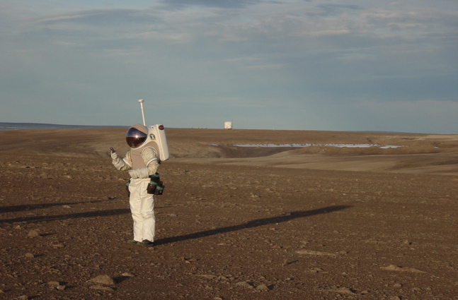 The <a href="http://www.marsonearth.org/">Haughton Mars Project</a> tested equipment and people bound for Mars - at a much more convenient location. Devon Island, Canada, is the world's largest uninhabited island, home to the Haughton crater, which is a 12-mile diameter impact area where a meteorite hit Earth 23 million years ago. The rocky Arctic polar desert setting, geologic features and biological attributes of the site offer unique insights into the possible evolution of Mars, say the researchers - in particular, the history of water and of past climates on Mars, the effects of impacts on Earth and on other planets, and the possibilities and limits of life in extreme environments. While no environment can come close to Mars' extremes in minimum temperature, dryness, low atmospheric pressure and harsh radiation conditions, the Arctic desert is just about as close as scientists can get. Pictured: Dr. Jeff Jones of NASA Johnson Space Center tests a space suit prototype in a late-night simulation.