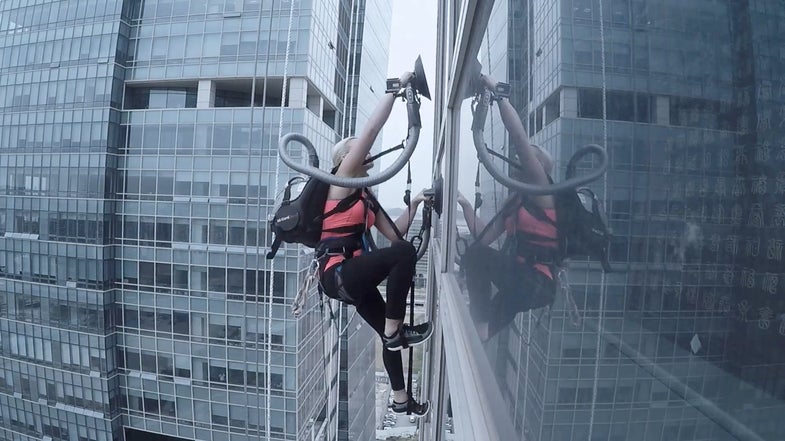 Watch This Woman Climb A Skyscraper With A Vacuum Cleaner