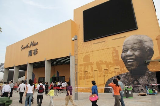 A smiling, 20-foot Nelson Mandela visage greets you personally.