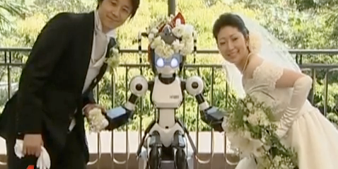 Video: Japanese Robot Officiates Wedding Of Two Humans