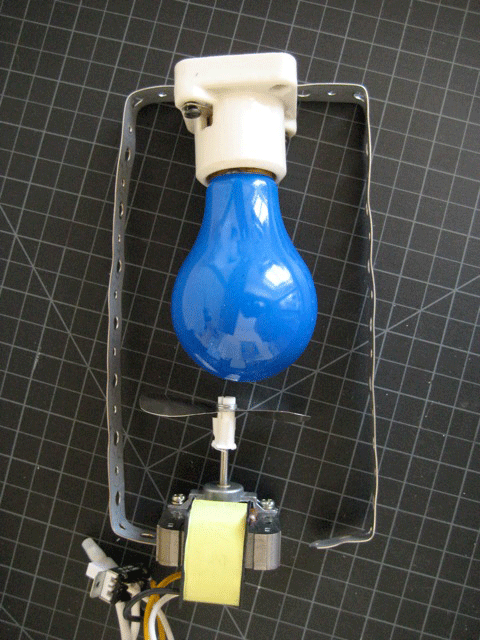 A blue light bulb inside a bracket with a motor and a propeller under it.