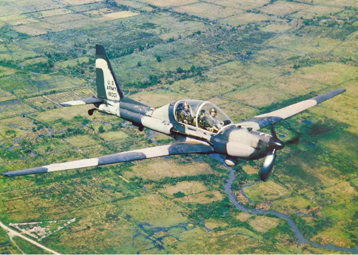 A rare sunlit run for a YO-3A, whose mottled gray camo made it almost invisible at night.
