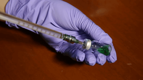 injection of medication via syringe