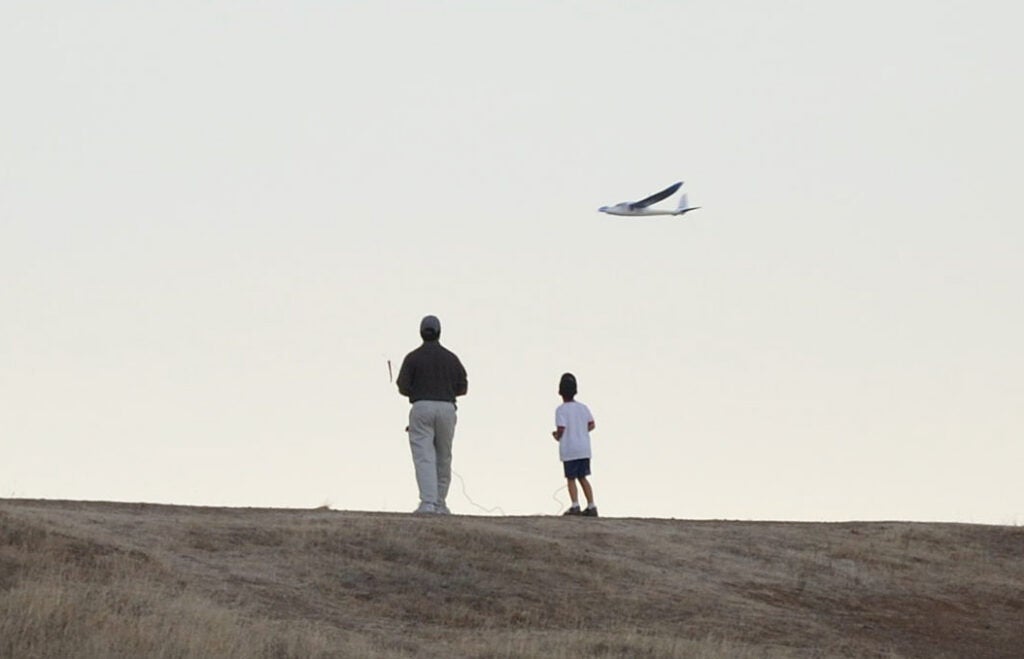 Father and Son Flying an RC Plane at Rancho San Antonio