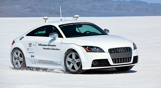 The autonomous Audi TTS sports car undergoes early testing in 2009 at Utah’s Bonneville Salt Flats. Researchers from the Volkswagen Automotive Innovation Laboratory, a Palo Alto, CA, joint venture between the Volkswagen Group’s Electronics Research Laboratory and the Stanford University School of Engineering, plan to steer the car up Colorado’s Pikes Peak this fall without a driver behind the wheel.