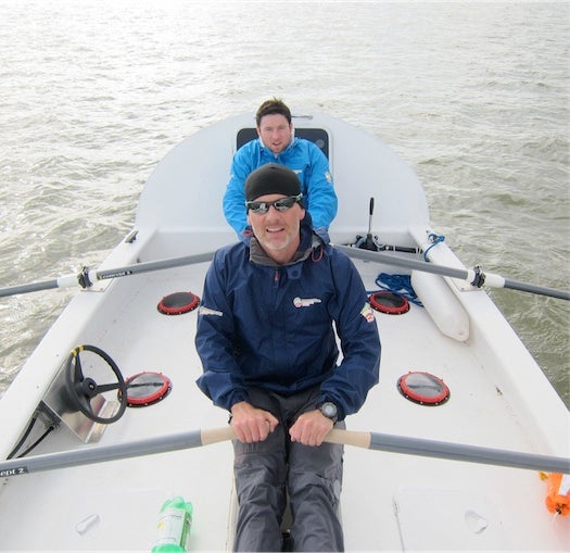 Adventurers Kevin Vallely (front) and Denis Barnett (back) in the boat they're taking through the Northwest Passage.