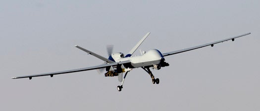The MQ-9 Reaper descends into an air field in Afghanistan Nov. 17. The Reaper is the Air Force's unmanned aerial attack vehicle, able to carry both precision-guided bombs and missiles. (U.S. Air Force photo/Staff Sgt. Brian Ferguson)(Released)