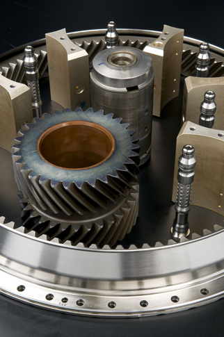 The gears in the Pure Power are placed between the compressor and the fan, which decouples the two, allowing for a more efficient arrangement: a big, slow fan shoving air into a small, fast turbine.