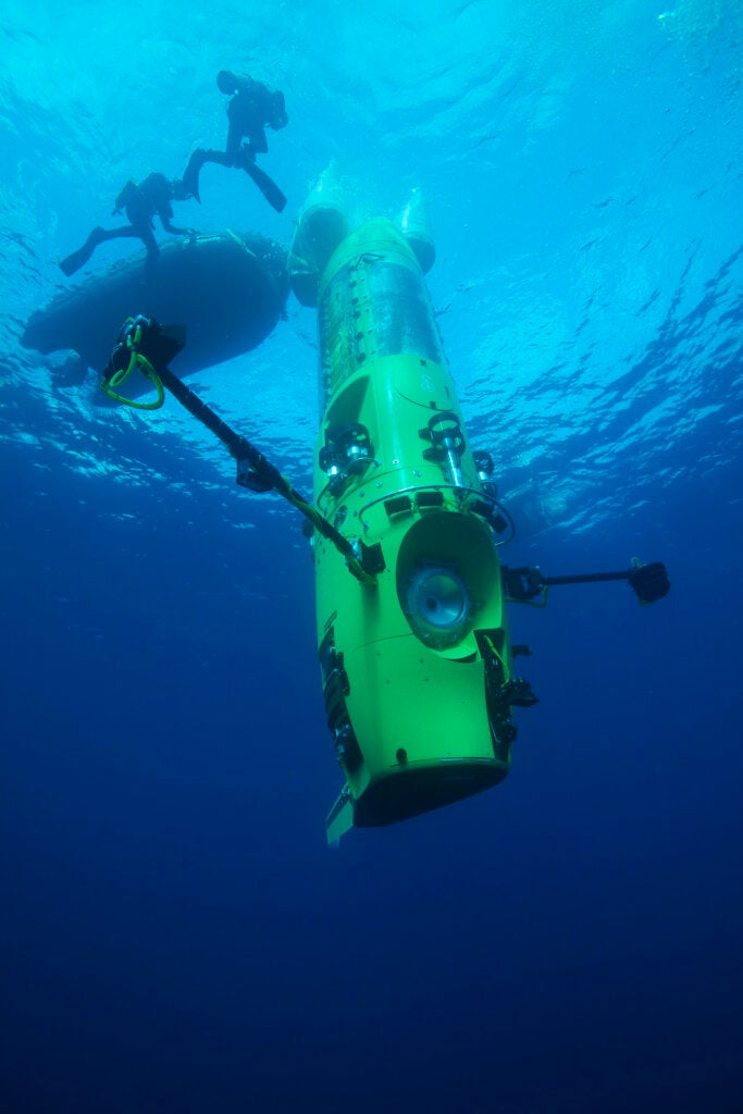 The DEEPSEA CHALLENGER submersible begins its first 2.5-mile (4-km) test dive off the coast of Papua New Guinea.