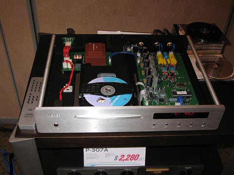 More component porn: a look inside <a href="http://www.usheraudio.com">Usher Audio's</a> P-307A CD player. I believe the $2,200 price includes the top.
