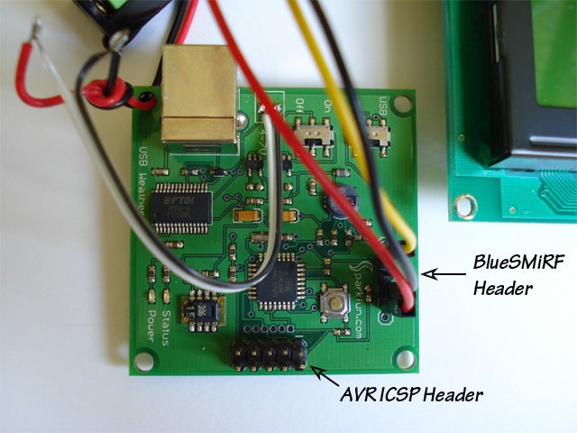 A weather board with wires coming out of it and the AVR ICSP header and BlueSMIRF headers labeled.