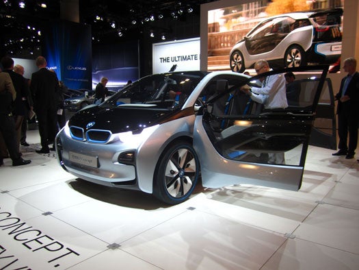 BMW presented their vision of the future with a matching set of concept cars. The all-electric i3 and the gas-electric hybrid, the i8. The i3 Concept is a swell looking compact electric vehicle that BMW said was designed for congested city driving. We think the "coach" style doors, its wide open interior layout and carbon fiber 'life module' - basically a carbon fiber monocoque to protect the passengers - makes for a neat little electric package. The concept is a test run for the production i3 model, set to début in 2013. Exterior designer Richard Kim said, "the i3 was a different kind of design process than any other process I had worked on before. The i3 was a ground up, first of its kind model. We had cutting edge technology and we had to think in a cutting edge way. Everything was new, even the sketching and designing. We had to streamline the entire design process. With the i3 design, we set out to create an expansive room, sitting on top of a very thin profile and that allowed design freedom."