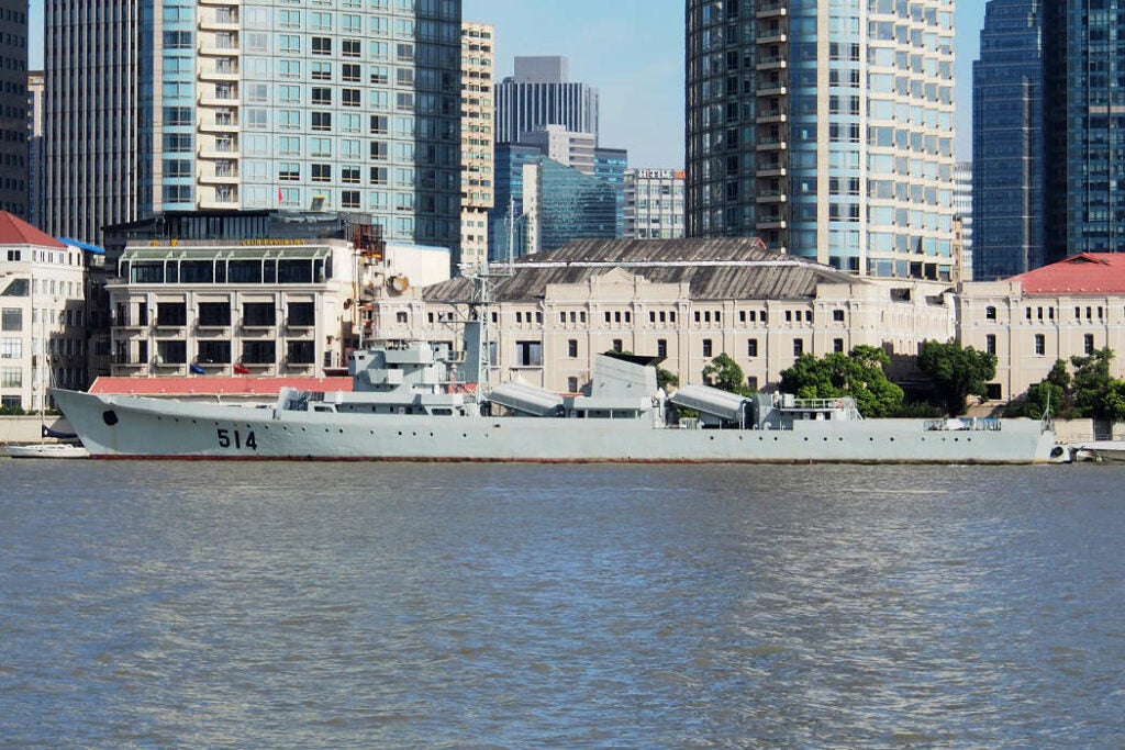 The Type 053 class frigate Zhenjiang was refitted in mid 2013, to delete its fore and aft gun turrets, to fit its second life as a target ship.