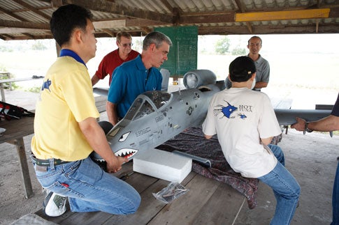 Selby and his team, which includes a three-star Air Force general and a top Thai jet engineer, prepare the model for a test flight in Thailand.