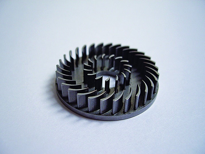A microturbine for a water pump made with electrochemical machining.