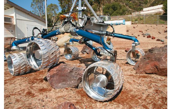 At twice the length and five times the weight of any of its predecessors, Curiosity is the brawniest and best-equipped rover ever sent to another planet. A plutonium-powered thermoelectric generator will give the SUV-size six-wheeler an anticipated life span of some 700 Earth-days, about eight times as long as its solar-powered predecessors were expected to last. Curiosity will cover up to 660 rugged feet a day, carrying a payload of scientific instruments 10 times as heavy as that of previous rovers. Among other things, it will be able to vaporize rocks using a laser, analyze the resulting gases, and bring the most interesting specimens on board for further study. Curiosity is set to launch in November and to arrive next August in the Gale Crater. <em>Jump to the beginning of the <a href="https://www.popsci.com/?image=11">Aviation &amp; Space</a> section.</em> <strong>Jump to another Best of What's New category:</strong>