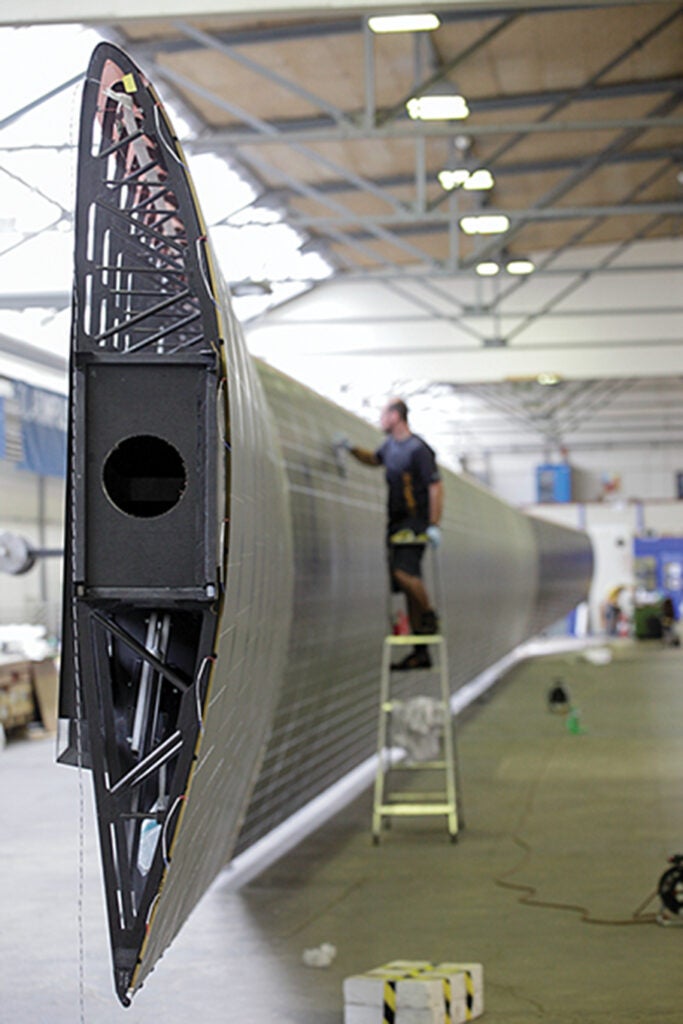 The solar plane's wing is made of carbon-fiber ribs and spars.