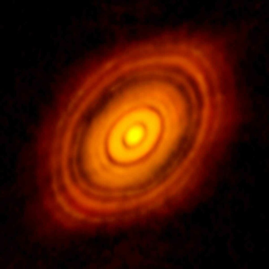 At the very center of the image above is the sun-like star HL Tau, surrounded by rings of dust and gas. You may never have heard of HL Tau, but this picture will go down in the astronomic annals as the first high-resolution image of the birth of a planetary system. Using the Atacama Large Millimeter/submillimeter Array (ALMA), an international observatory in northern Chile, scientists were able to capture this image, showcasing the early stages of a planetary system forming around HL Tau—a celestial ultrasound of a <a href="https://www.popsci.com/article/science/astronomers-capture-beautiful-image-distant-planets-forming/">distant solar system</a>. <a href="https://www.popsci.com/article/science/rainbow-clouds-cyber-dogs-and-other-amazing-images-week/"><em>From November 7, 2014</em></a>