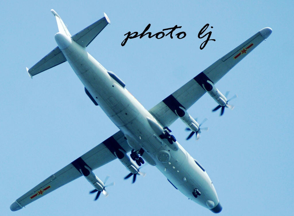 The underside of the Y-8GX8 shows two sensor domes under the fuselage, one sensor dome on the nose, two pairs of arrays on starboard and port, and two fairings at the wingtips.