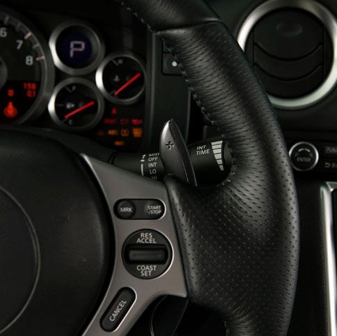 The paddle shifters on the steering wheel connect to a dual-clutch transmission.