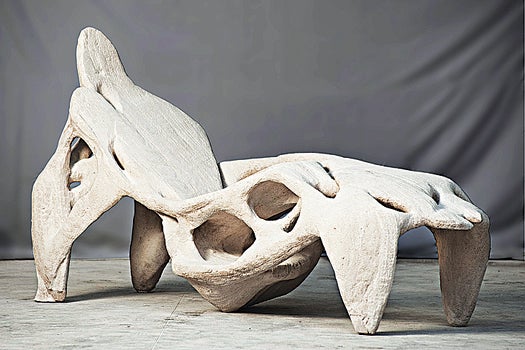 D-Shape can make novel stone forms, like this six-foot chair.
