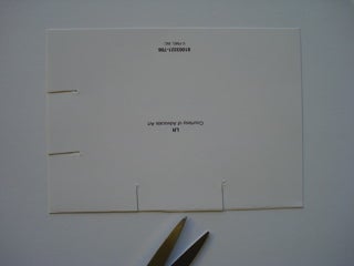 A template for cutting slits in holiday cards.