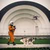 I mean, it’s obvious that an astronaut would walk their dog with a drone, while looking dapper and strutting down the street in their space suit.