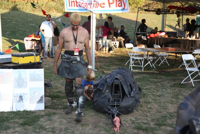 Maker Faire's always a little bit Burning Man. This gentleman who assembles sculptures from found junk and discarded electronics probably feels right at home in the Nevada desert, but the major Maker Faire difference? Kid-friendly.