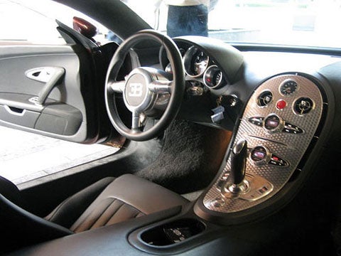 The driver can shift using either the shift knob or the two wheel-mounted paddles. The Veyron can also be driving in fully automatic mode-and is docile enough that even grannies can put the pedal to the metal without spinning out of control.