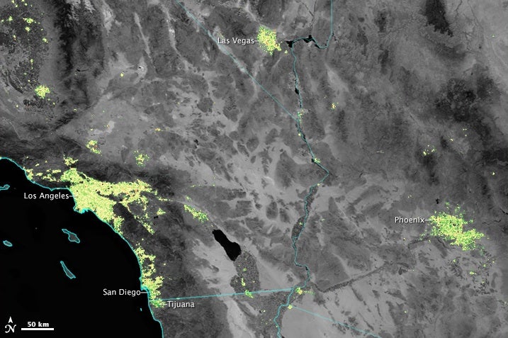 satellite image of the American Southwest, with cities marked that use more light at night during the winter holidays