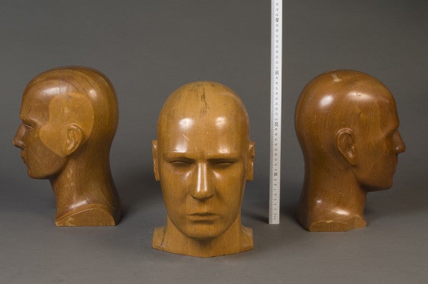 Paper weights? Pieces of art? NIST's best guess is that these heads were used for hearing aid testing.
