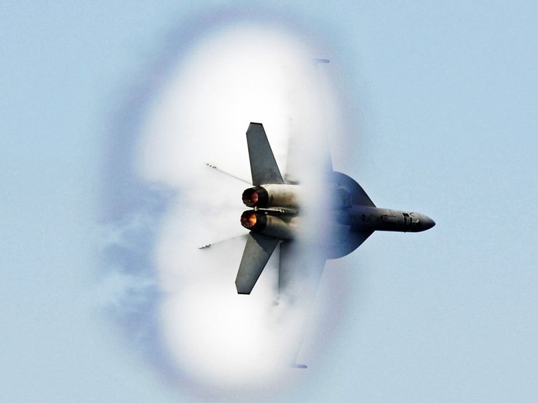 This is what it looks like when an F/A 18F Super Hornet bursts through the sound barrier. Read more <a href="http://www.businessinsider.com/look-at-these-awesome-pictures-of-supersonic-jets-smashing-the-sound-barrier-2012-6#this-fa-18f-super-hornet-flew-over-visitors-aboard-the-uss-kitty-hawk-and-stunned-everyone-with-a-supersonic-demo-1">here</a>.